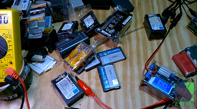 A pile of discarded lithium ion cell phone batteries for recycling project (experimental)