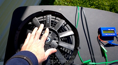 24v car radiator fan being bench tested for direct solar shed ventilation applications outdoors 50 watt solar panel